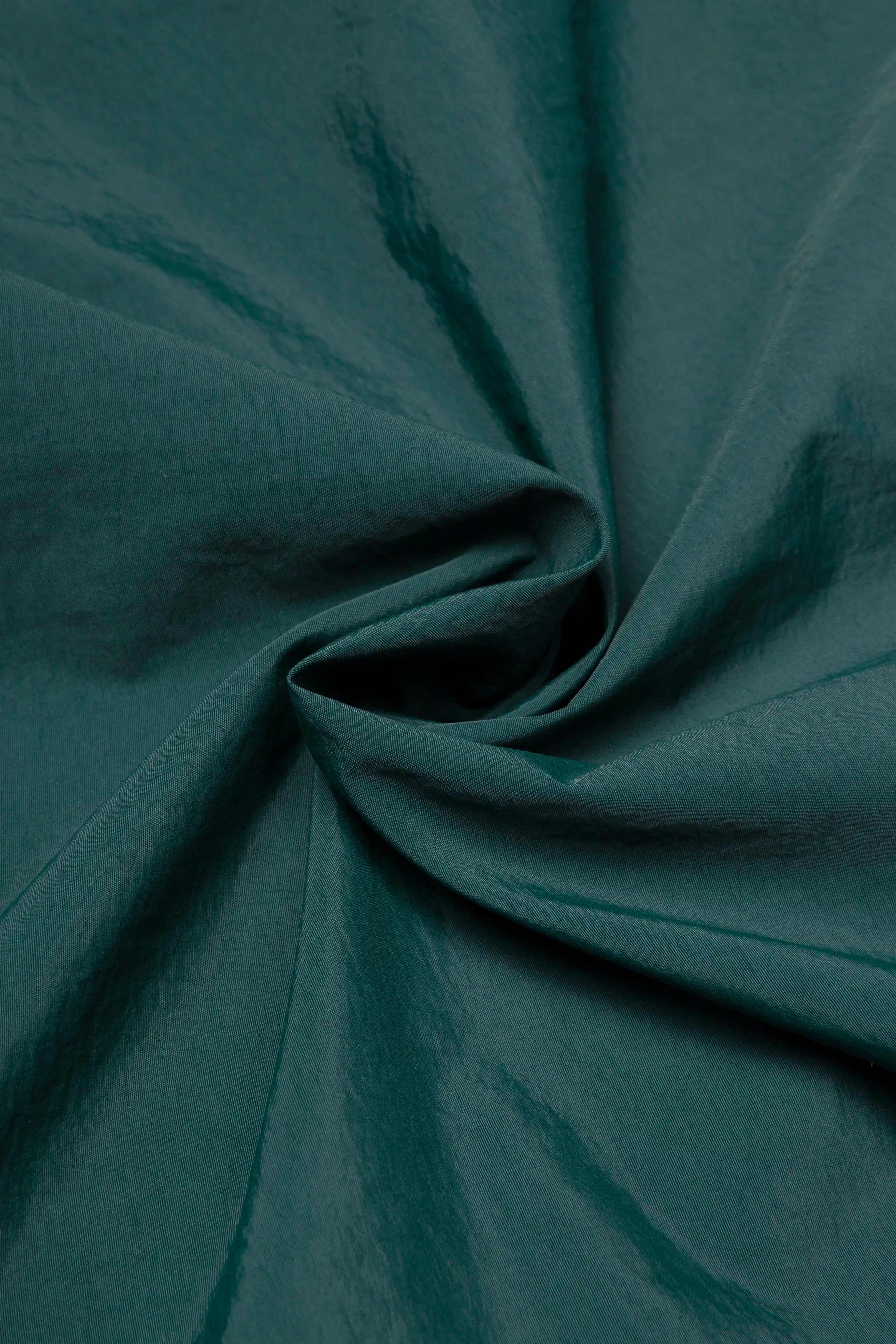 CHAQUETA ROMPEVIENTOS COLOR VERDE TORMENTA