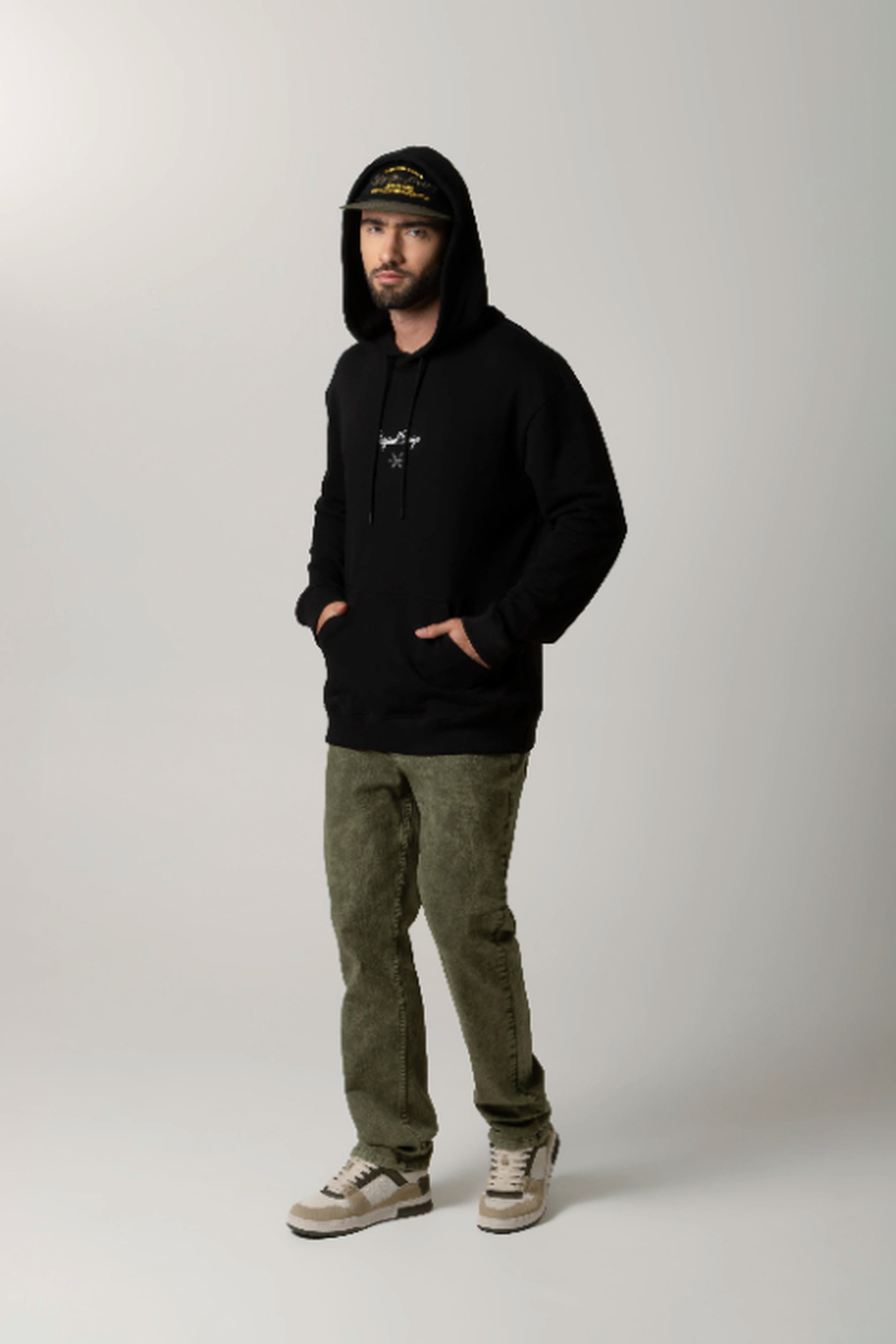 BUZO CERRADO COLOR NEGRO MARCA QUEST X JUAN FERNANDO QUINTERO