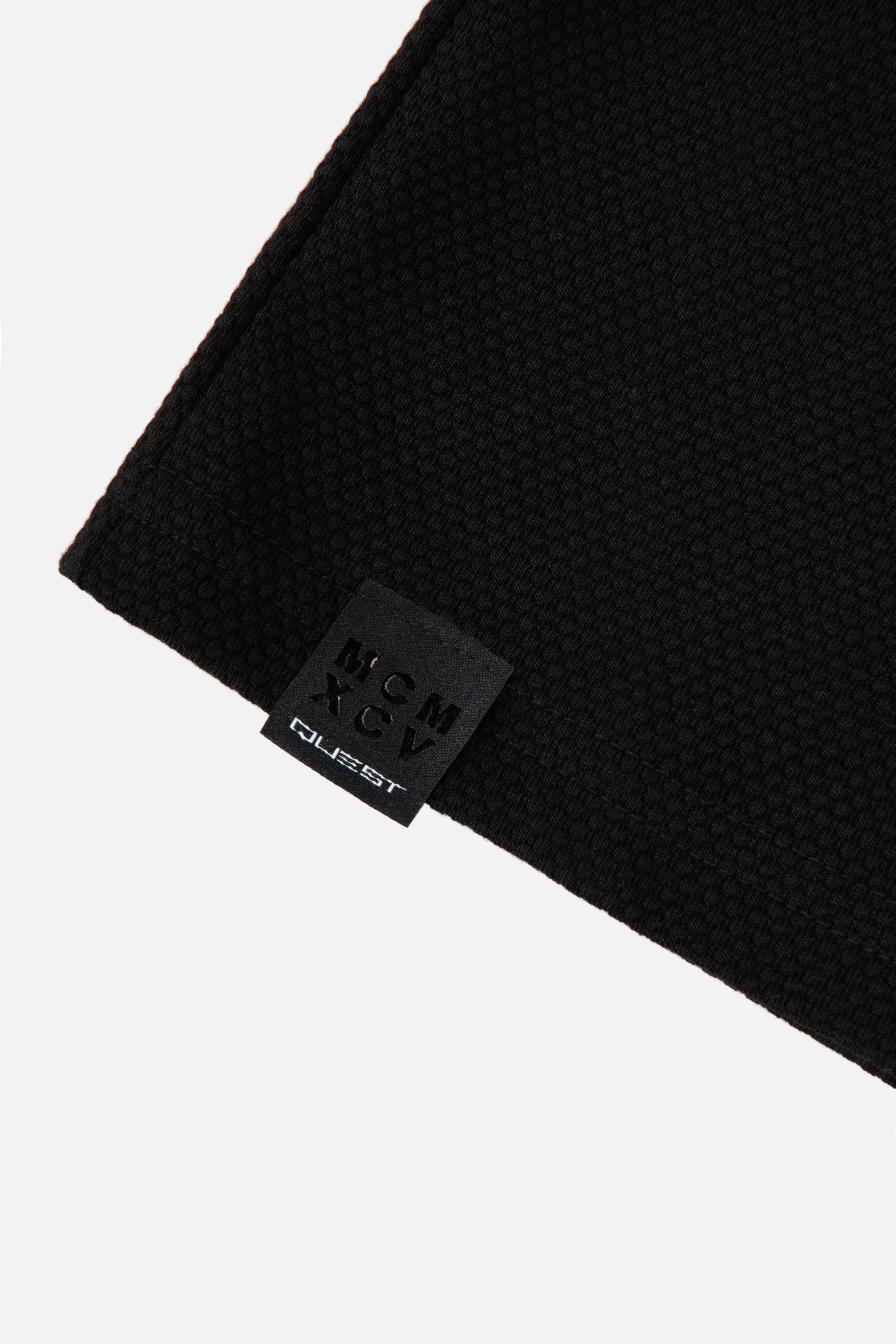 POLO MANGA LARGA COLOR NEGRO