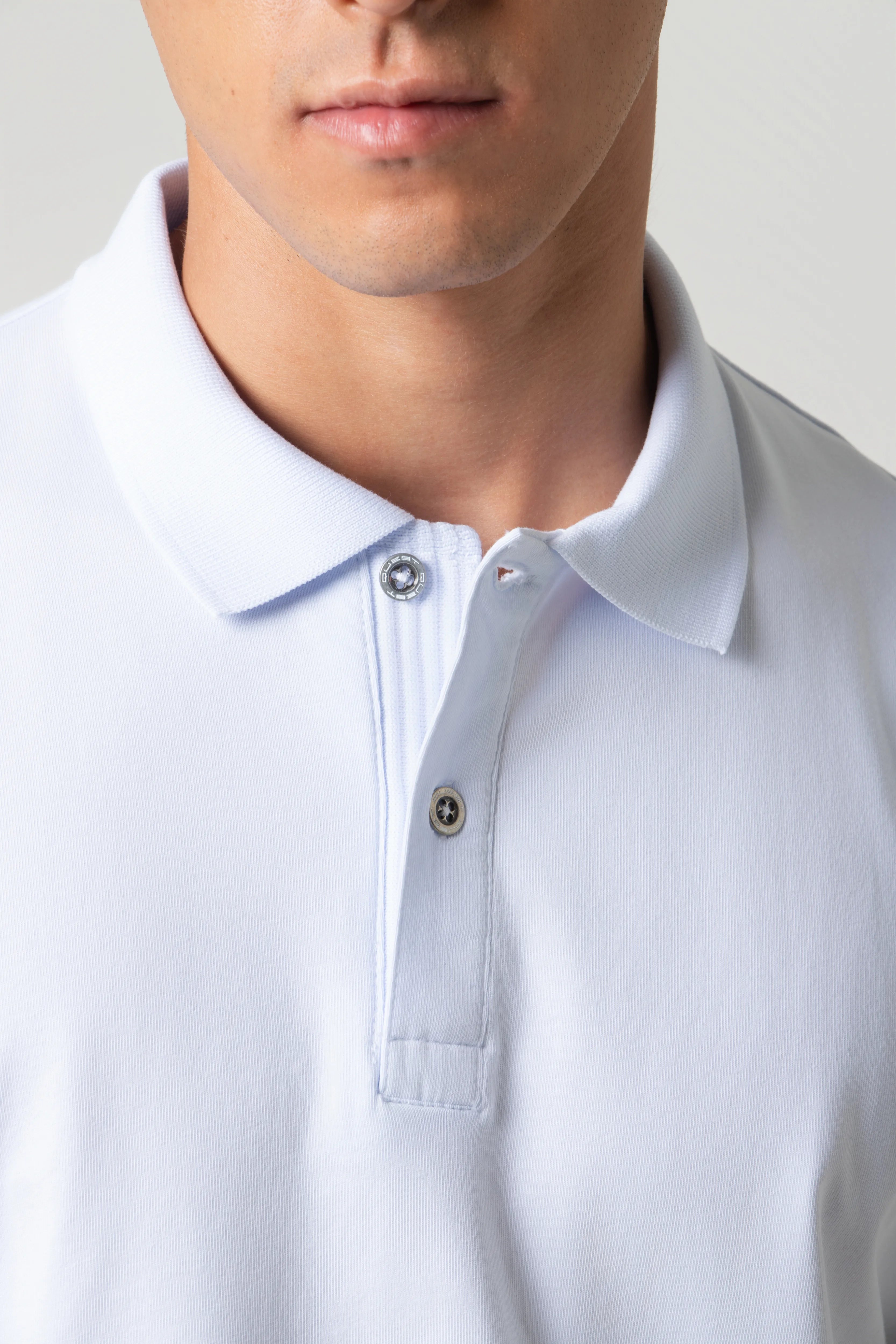 POLO MANGA CORTA COLOR BLANCO OPTICO