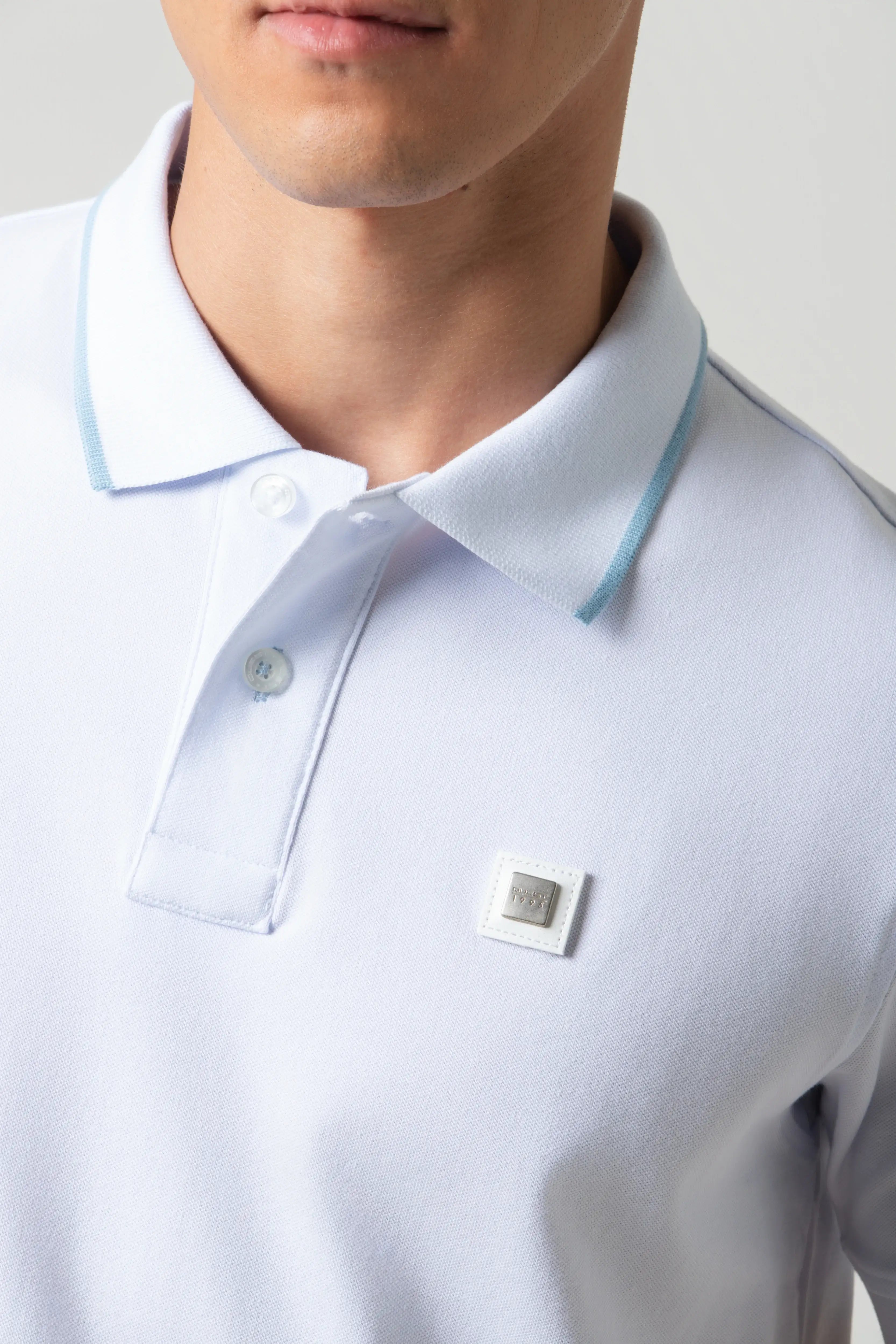 POLO TIPPING COLOR BLANCO-AZUL GLACIAR