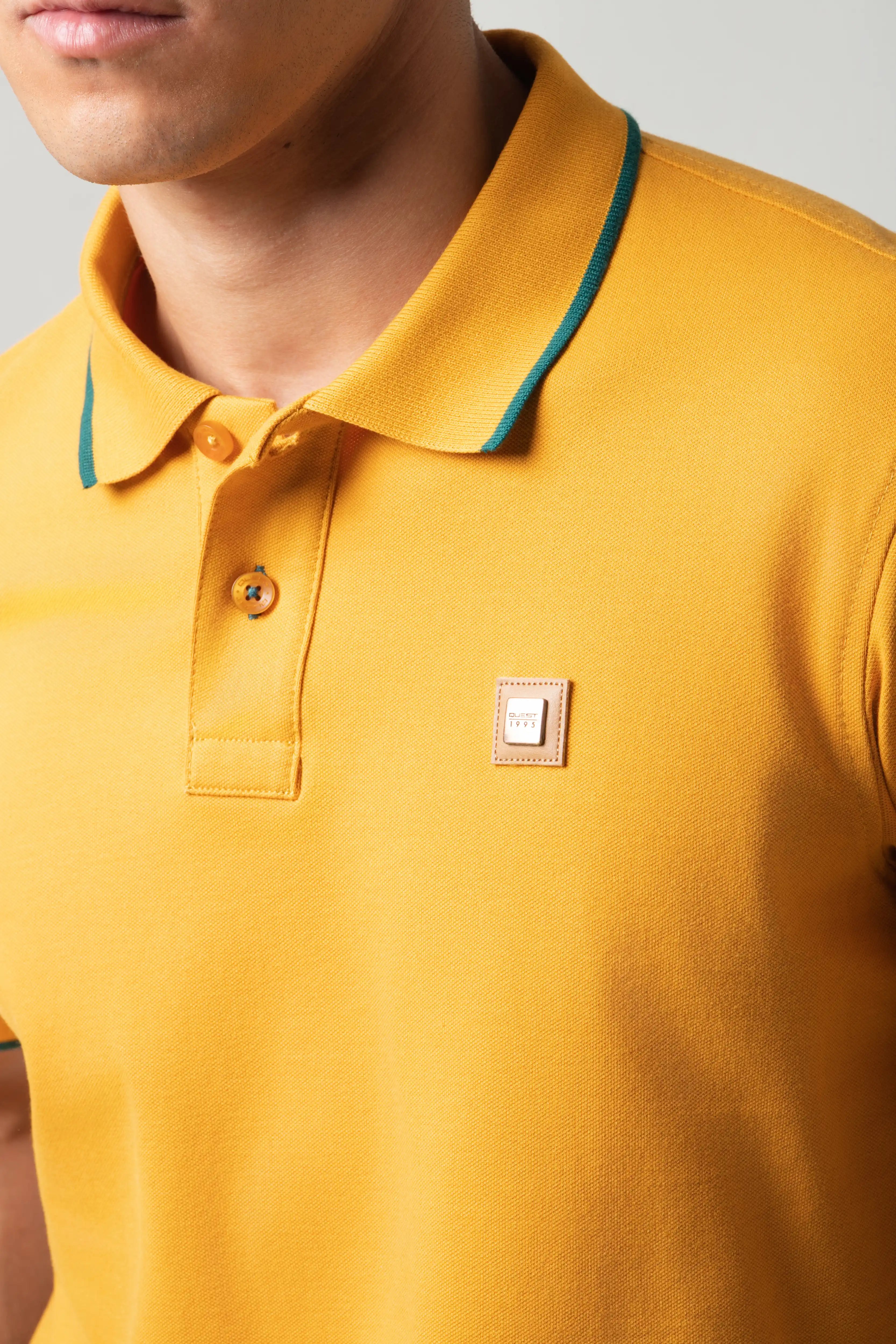 POLO TIPPING COLOR MOSTAZA - VERDE TORMENTA