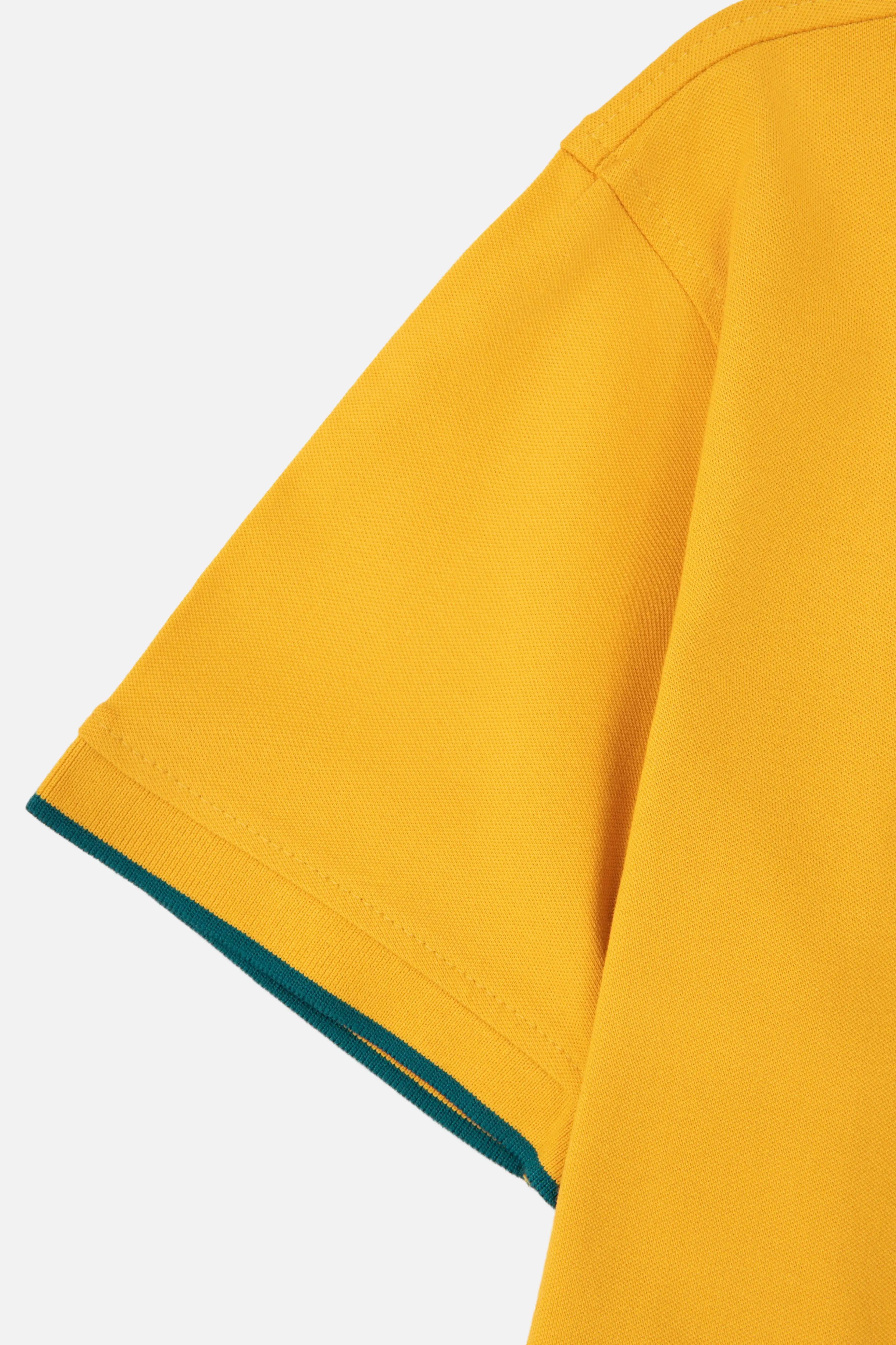 POLO TIPPING COLOR MOSTAZA - VERDE TORMENTA