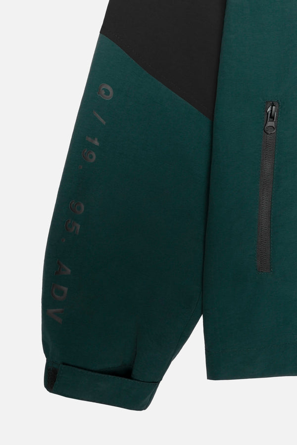 CHAQUETA ROMPEVIENTOS COLOR VERDE TORMENTA