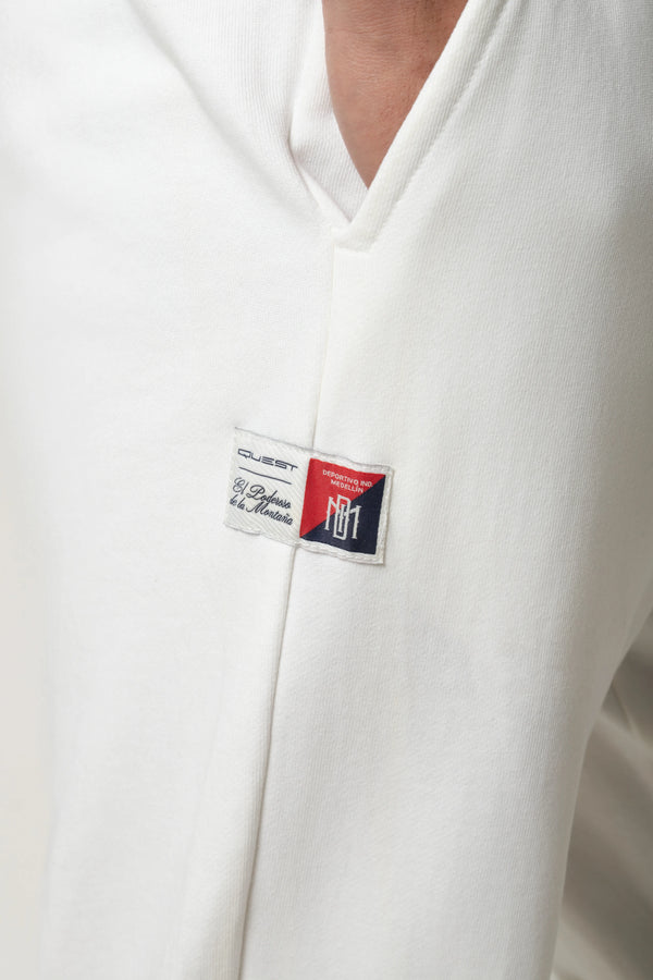 PANTALON JOGG SLIM CON ESTAMPADO DIM