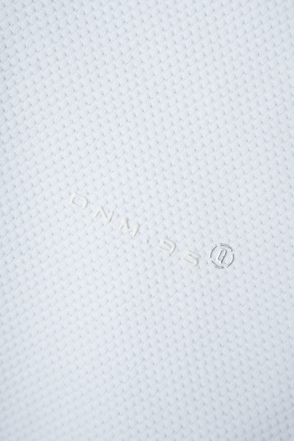 POLO MANGA CORTA COLOR BLANCO OPTICO