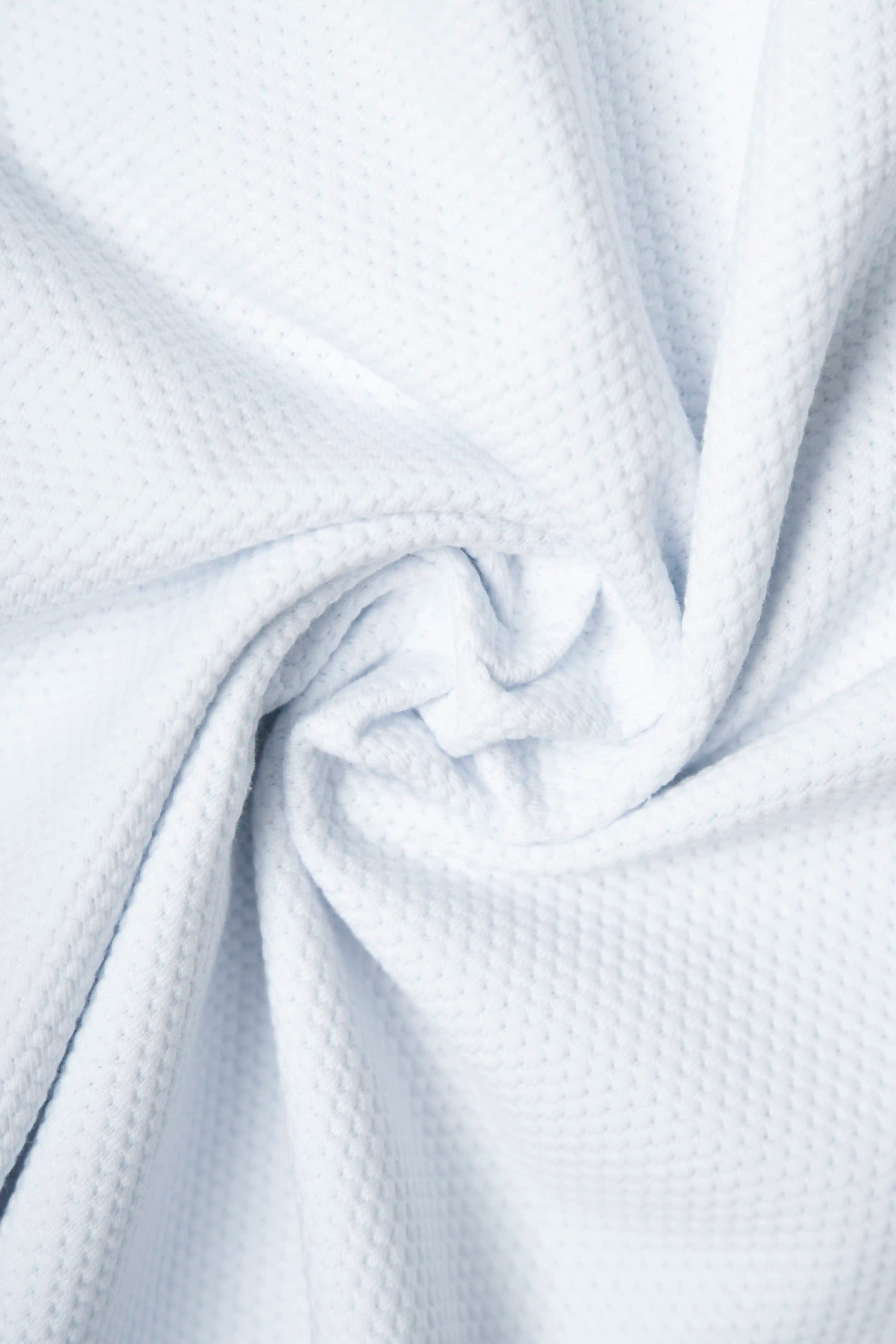 POLO MANGA CORTA COLOR BLANCO OPTICO
