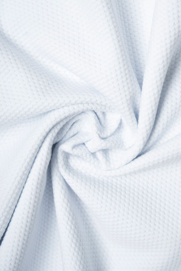 POLO MANGA CORTA COLOR BLANCO OPTICO
