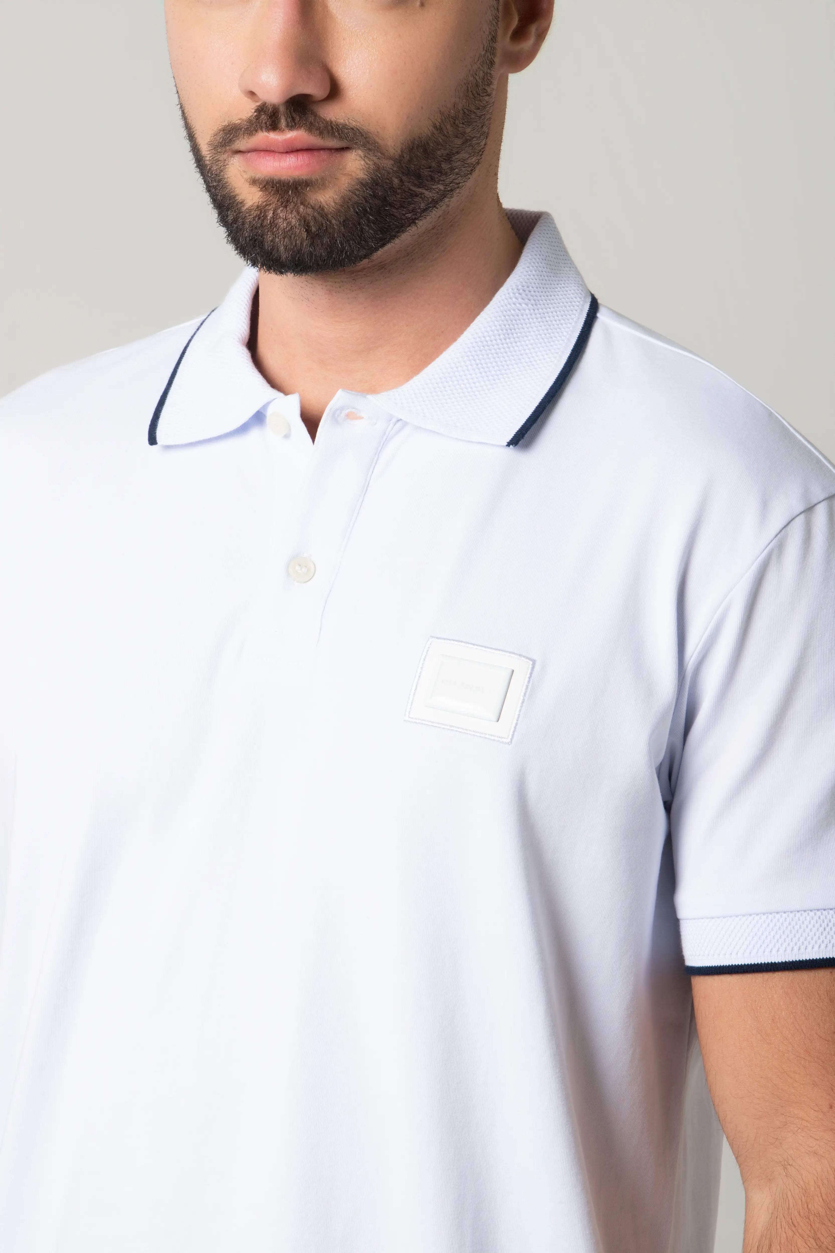 POLO MANGA CORTA COLOR BLANCO OPTICO