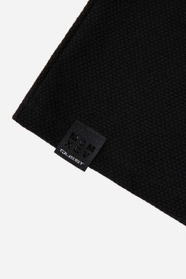 POLO MANGA LARGA COLOR NEGRO