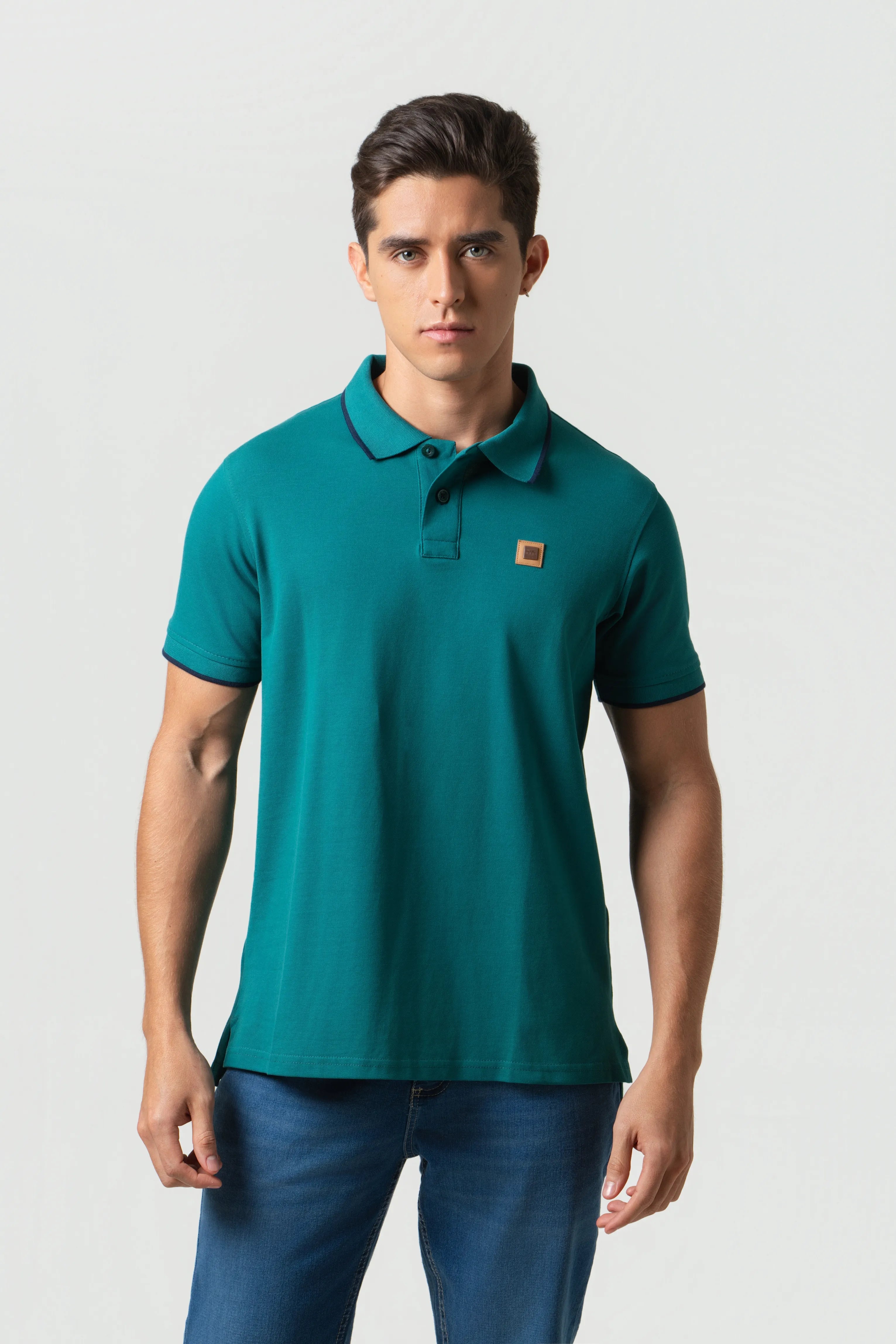 POLO TIPPING COLOR VERDE TORMENTA-AZUL NOCHE