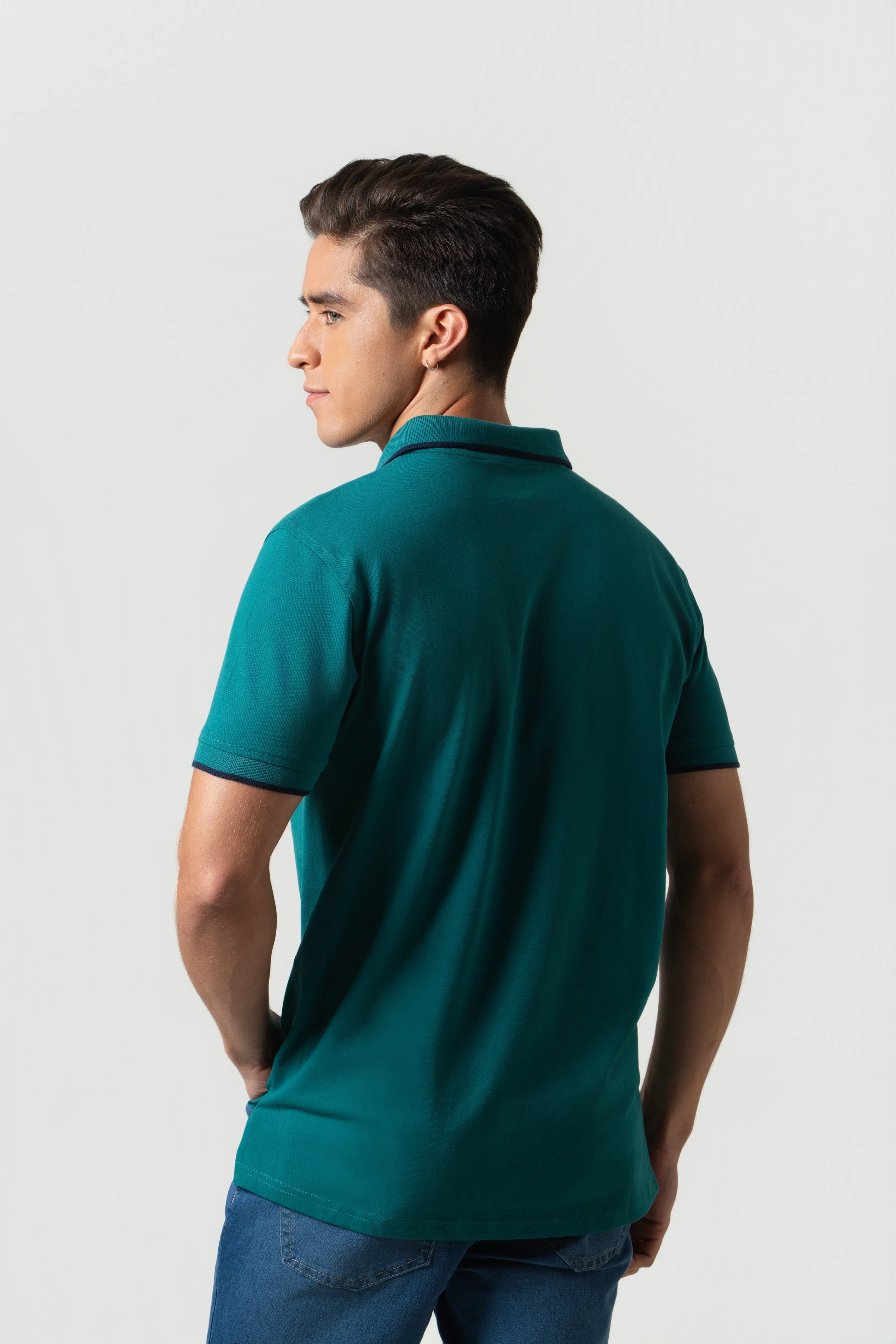 POLO TIPPING COLOR VERDE TORMENTA-AZUL NOCHE