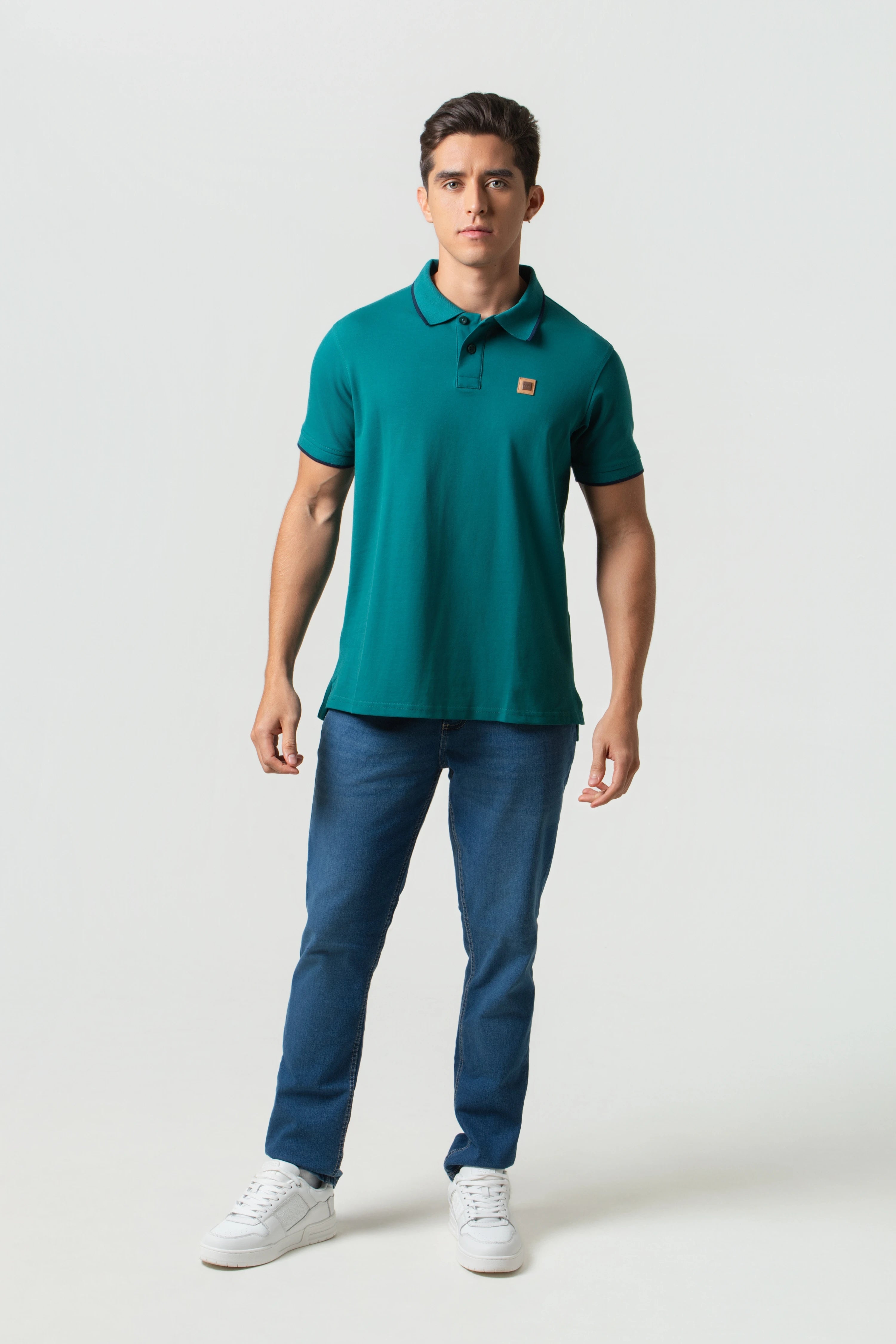 POLO TIPPING COLOR VERDE TORMENTA-AZUL NOCHE