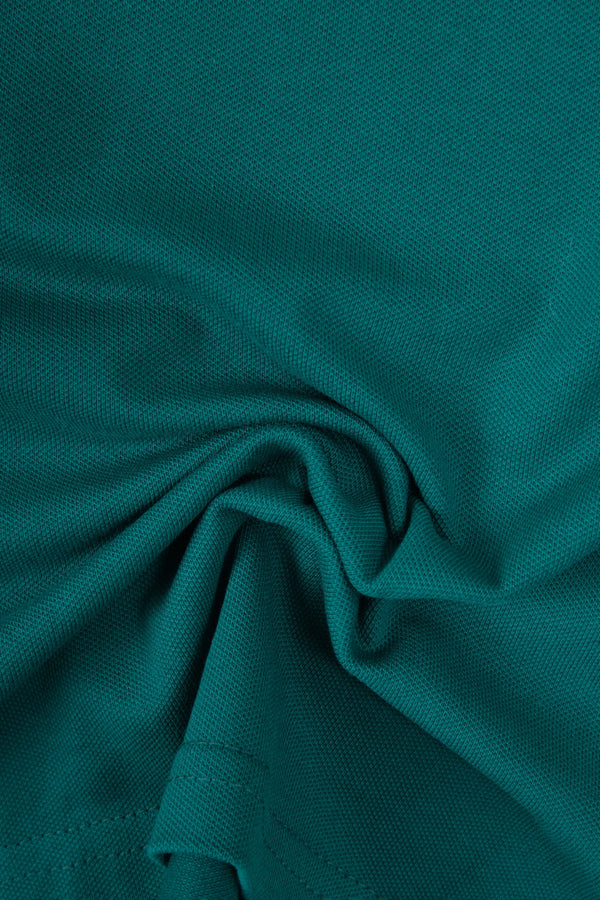 POLO TIPPING COLOR VERDE TORMENTA-AZUL NOCHE