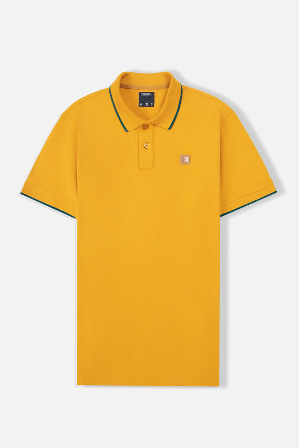 POLO TIPPING COLOR MOSTAZA - VERDE TORMENTA