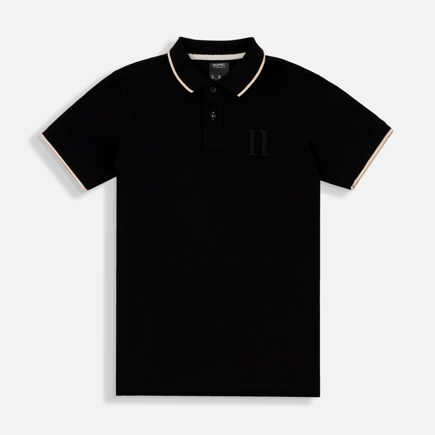 POLO MANGA CORTA COLOR NEGRO-IVORY MARFIL