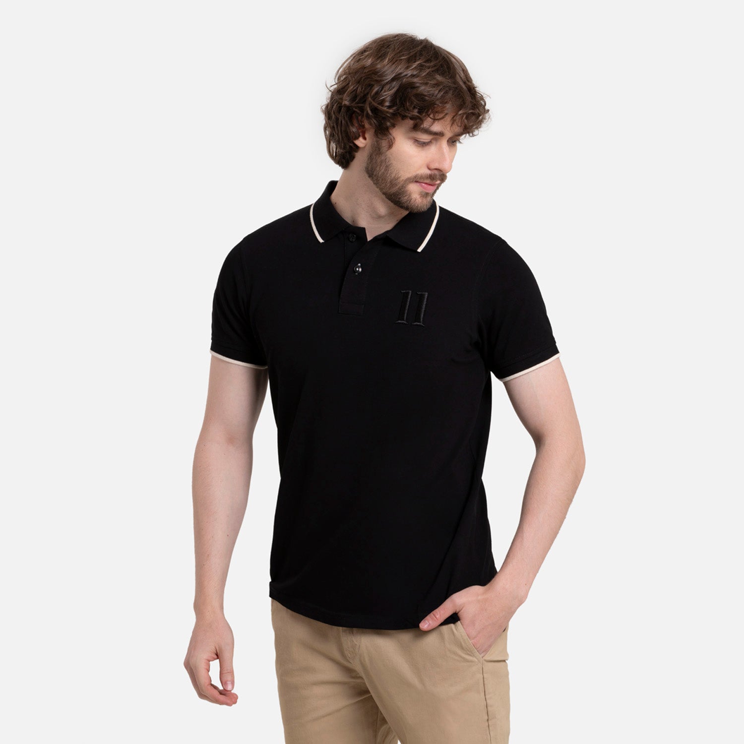 POLO MANGA CORTA COLOR NEGRO-IVORY MARFIL